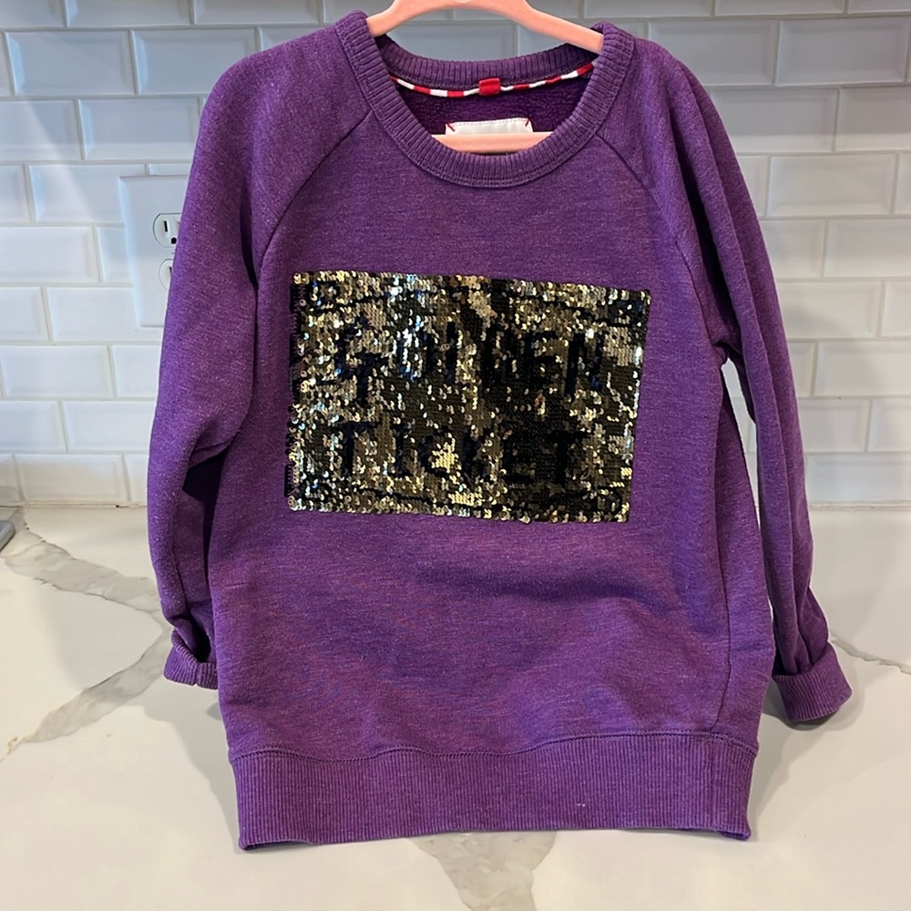 Re-posh, wore once. Super cute purple sequence Golden Ticket sweatshirt